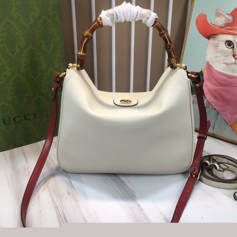 G*u*i top handle bags